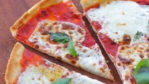 Gluten free pizza with tomato sauce, mozzarella and basil