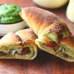 Calzone pizza with basil pesto, cherry tomatoes and provolone cheese recipe