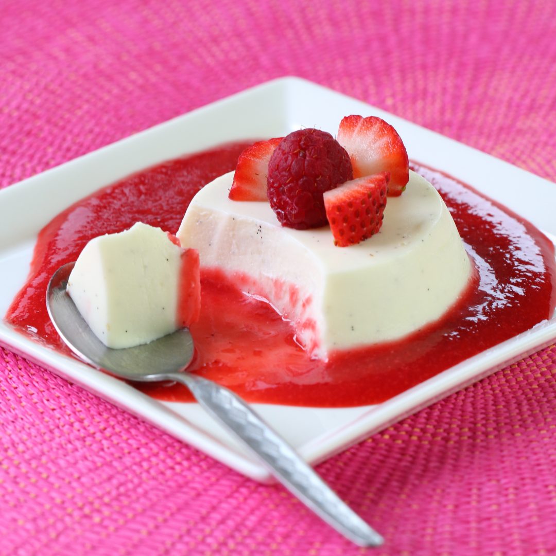 Vanilla Bean Panna Cotta with fresh berries sauce vegetarian Buona